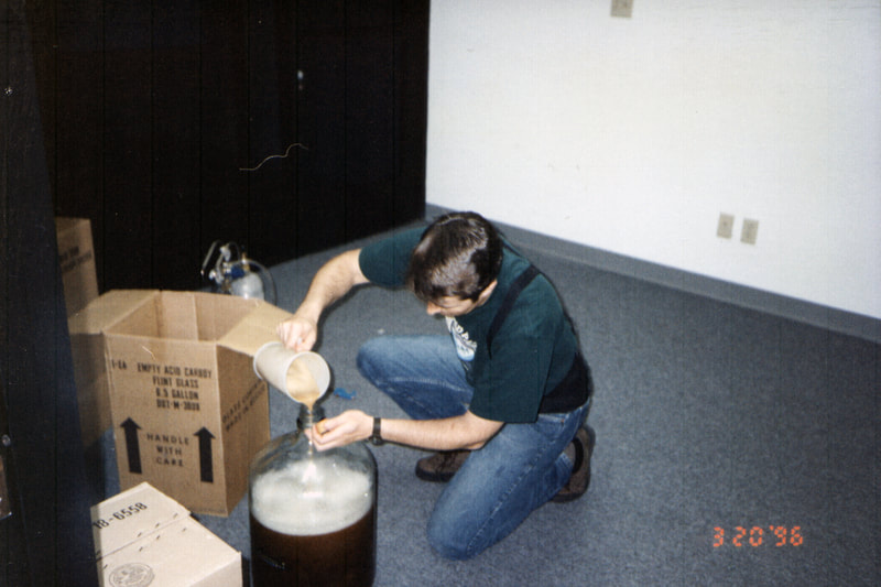 Photo of Greg Koch with homebrew kit