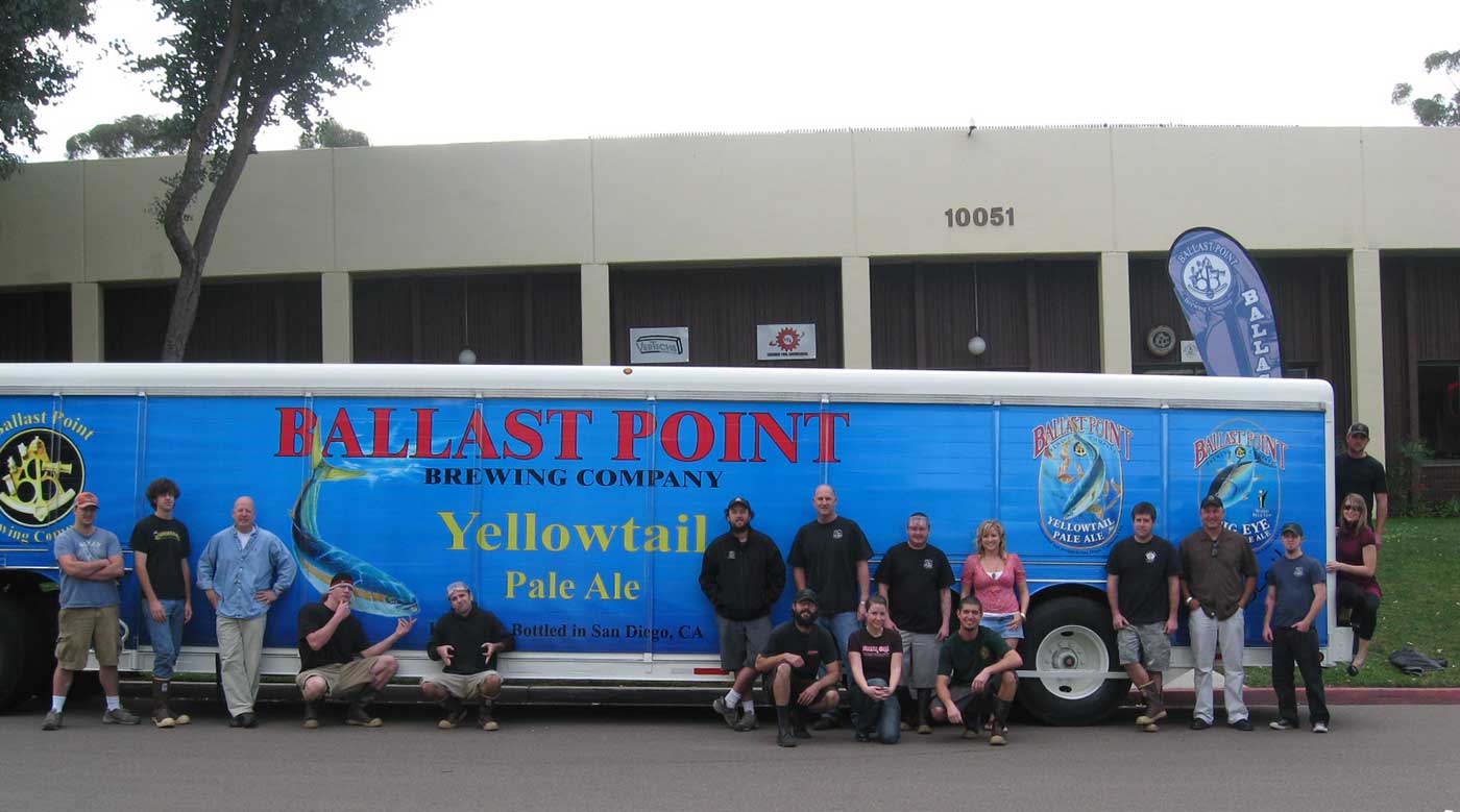 Picture of Ballast Point employees in front of large delivery truck