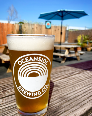 Picture of beer with Oceanside Brewing Co. logo on pint glass
