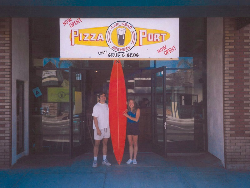Picture of Vince and Gina Marsaglia in front of Pizza Port Carlsbad
