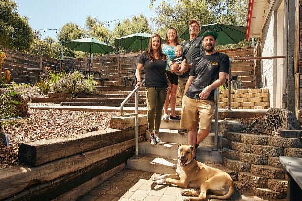 Picture of Mcilhenney family in their brewery outdoor space